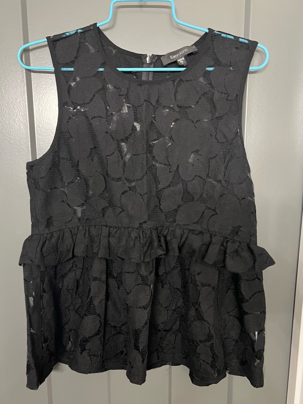 Karen Kane women’s Black Floral Lace Peplum top. Size medium.